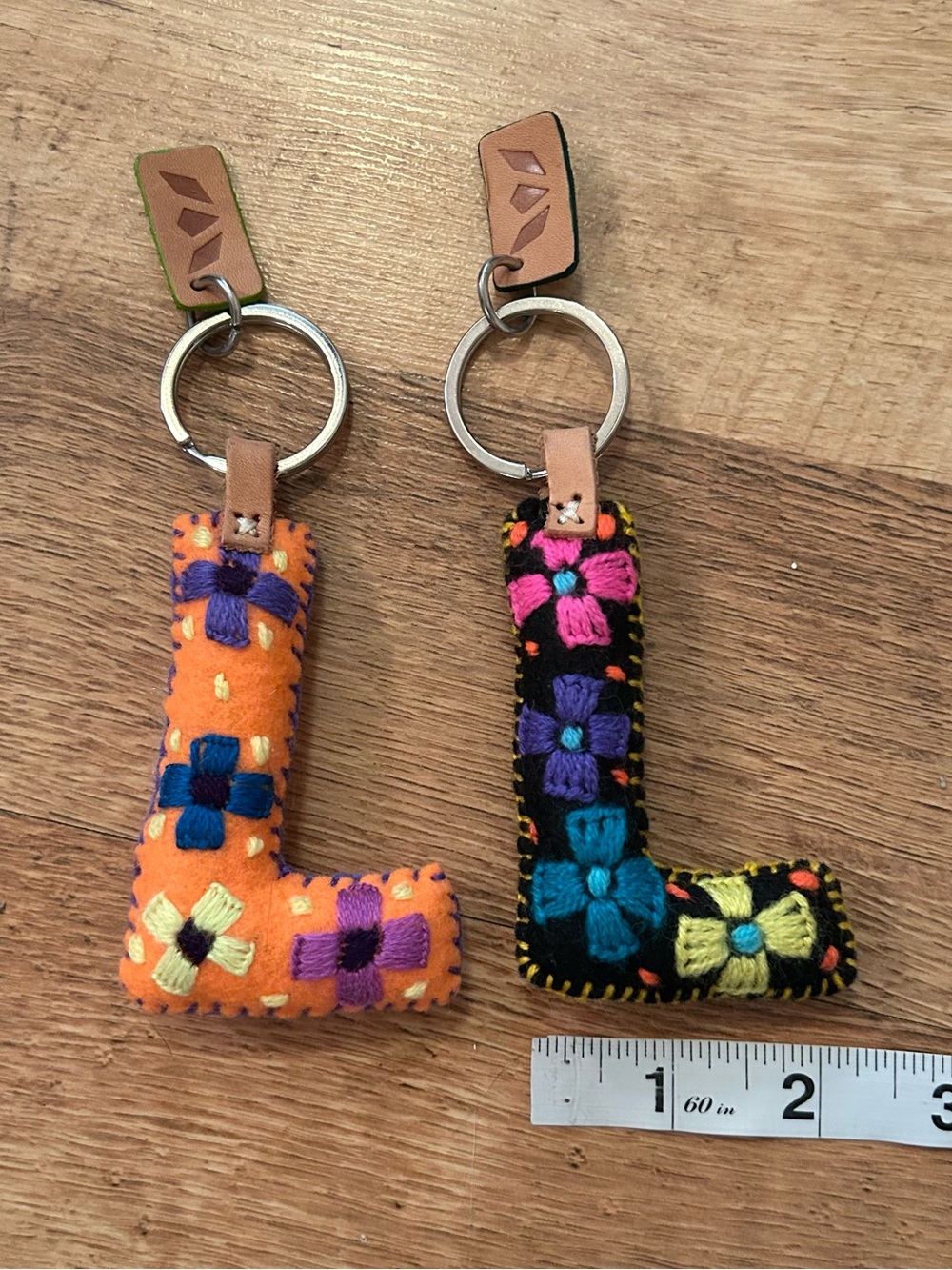 Consuela Two Embroidered Felt Letter “L” Bag Charms in Black and Orange - Picture 2 of 8